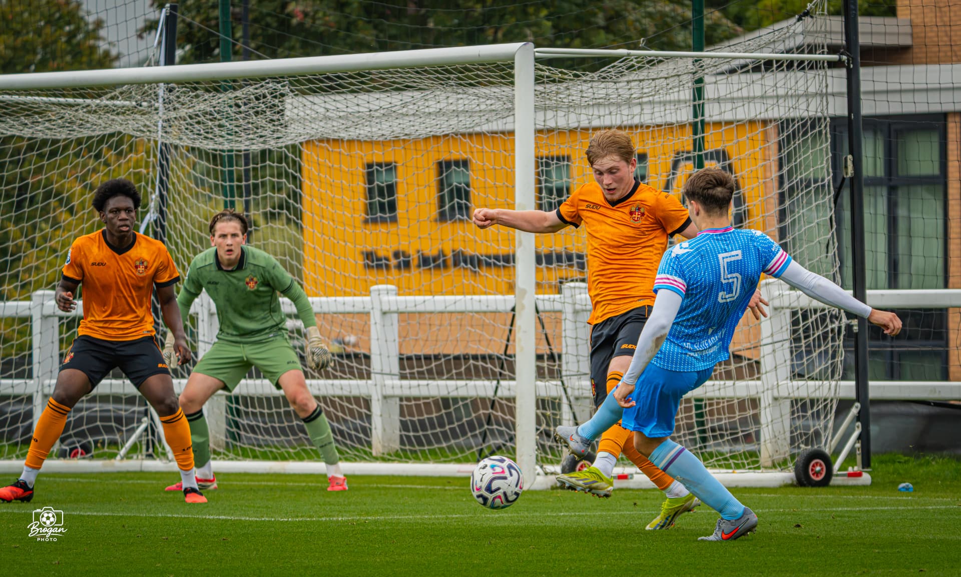 AR Elite player shooting at goal against Wolves U18