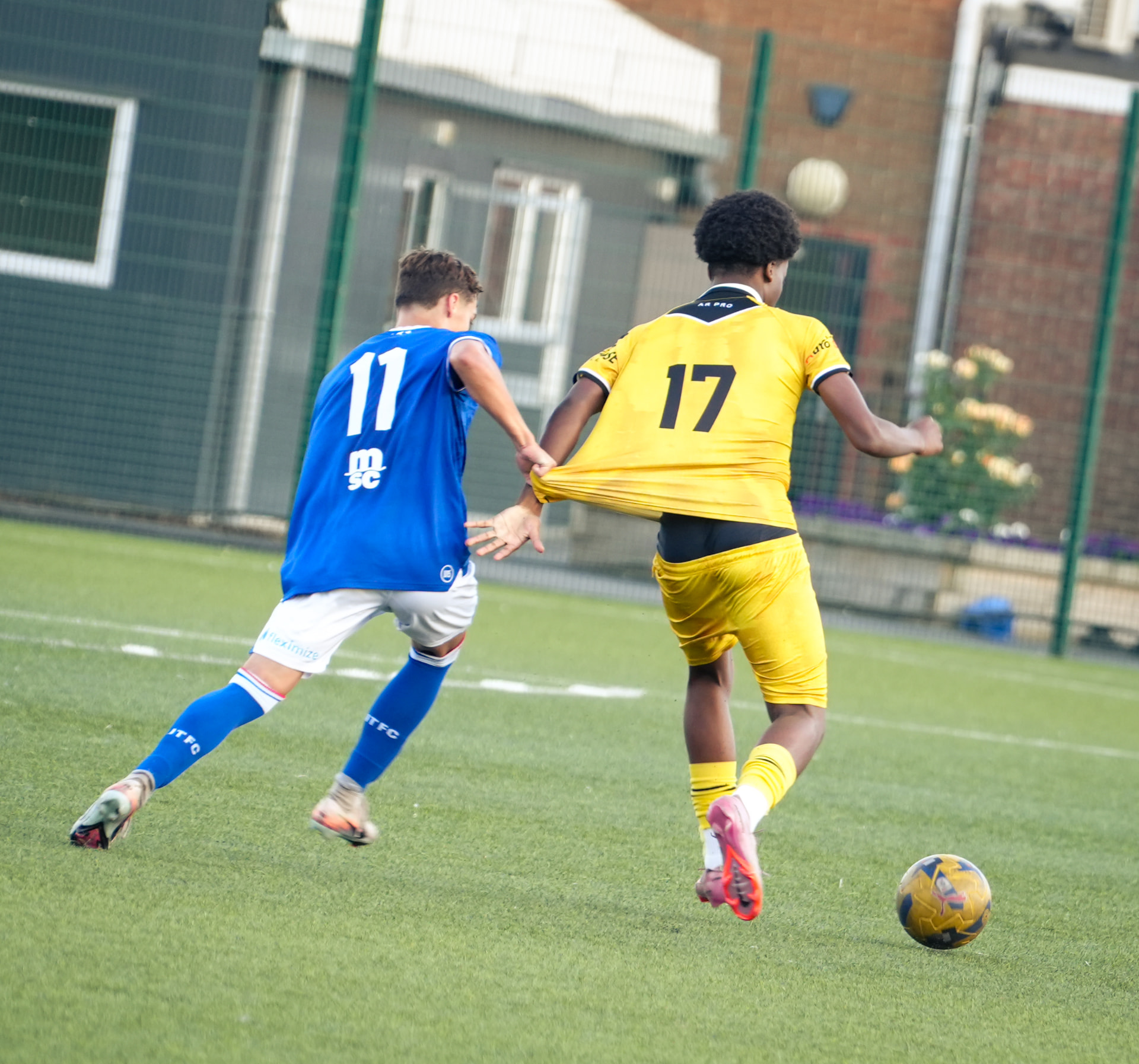 AR Elite winger driving past an Ipswich defender